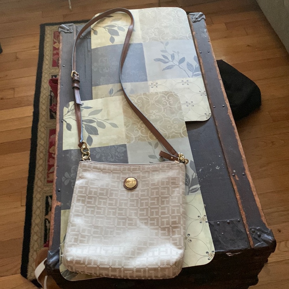 Handbag crossbody back pouch for passports or cell phone easy access.